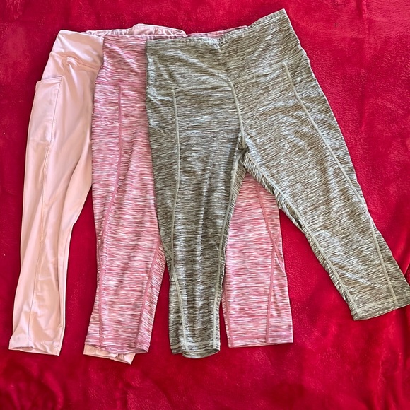 3/4 length leggings. 2 pair of sportswear(medium), one pair of SRX active (L) - Picture 1 of 3